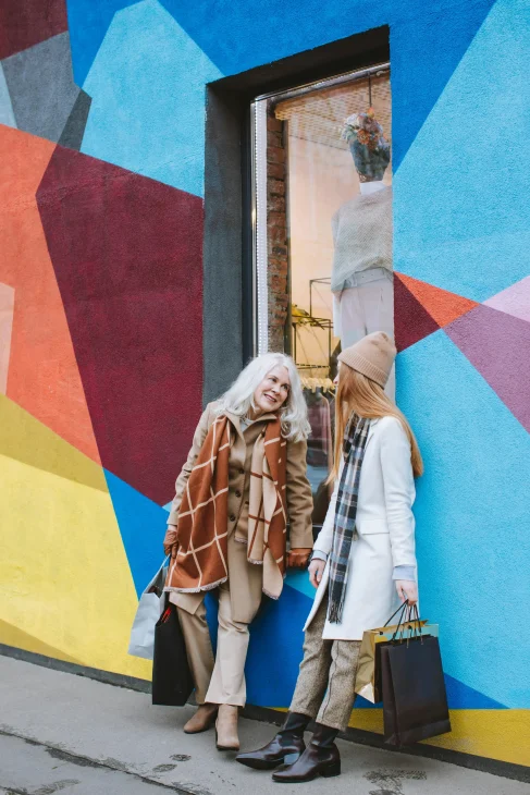 oversized coat with a wool scarf and chunky boots.